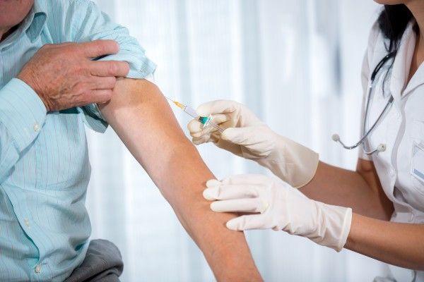 A patient receiving a vaccination